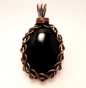uniquely black braid copper pendant front