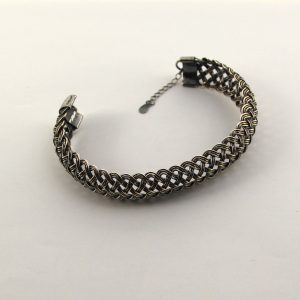 Braided bracelet on white background