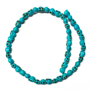 Synth Turquoise Blue Small Skull Beads